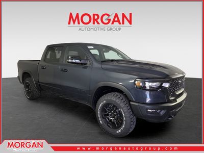 2026 Ram 1500 Rebel in Blue — front three-quarter view
