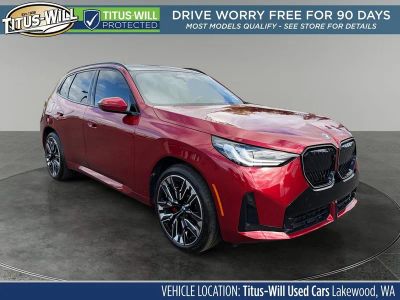 2025 BMW X3 30 xDrive in Red Metallic — front three-quarter view