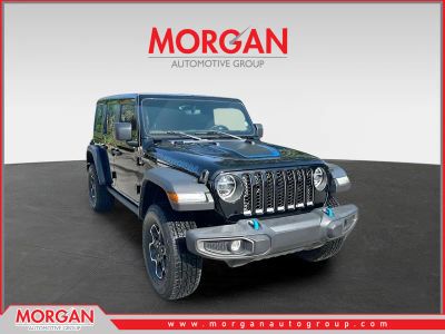 2022 Jeep Wrangler Unlimited Rubicon 4xe in Black — front three-quarter view