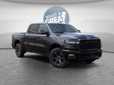 2026 RAM 1500 Big Horn/Lone Star in Diamond Black Crystal Pearl-Coat Exterior Paint — front three-quarter view