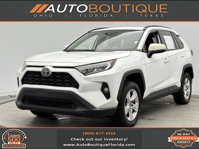 2019 Toyota RAV4 XLE in White — front three-quarter view
