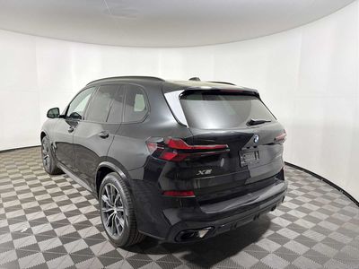 2026 BMW X5 xDrive40i — rear three-quarter view