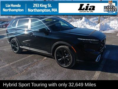 2023 Honda CR-V Hybrid Sport Touring — side profile view