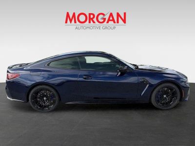 2026 BMW M4 — rear three-quarter view