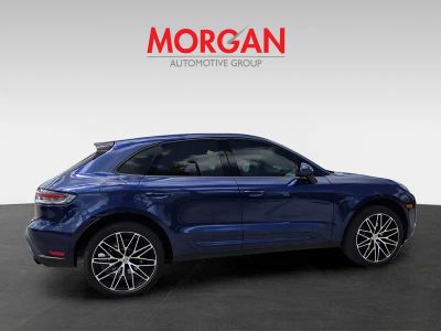 2024 Porsche Macan — rear three-quarter view
