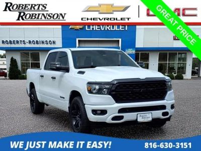 2024 RAM 1500 Big Horn in White — front three-quarter view