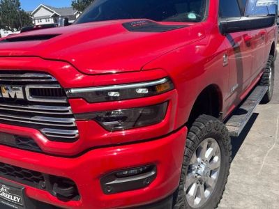 2026 RAM 2500 Laramie Crew Cab 4x4 6'4' Box in Flame Red Clearcoat — front three-quarter view