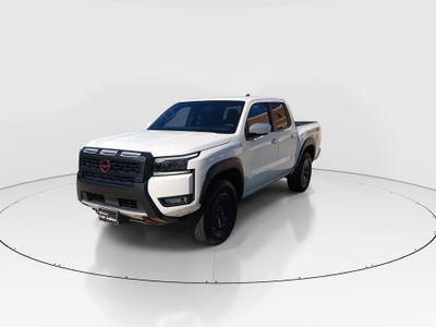 2026 Nissan Frontier — rear three-quarter view