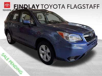 2016 Subaru Forester 2.5i Premium in Quartz Blue Pearl — front three-quarter view