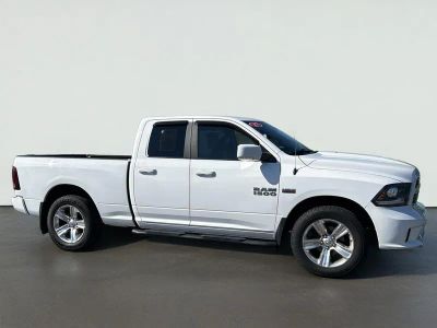 2017 RAM 1500 Sport in Bright White Clearcoat — front three-quarter view