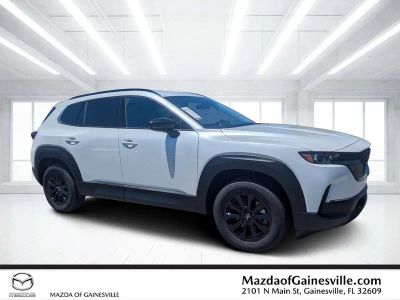 2026 Mazda CX-50 Hybrid Premium in Beige — front three-quarter view
