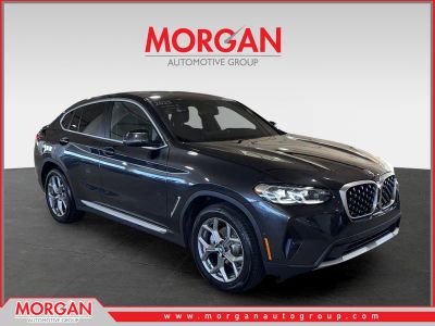 2025 BMW X4 xDrive30i in Gray — front three-quarter view