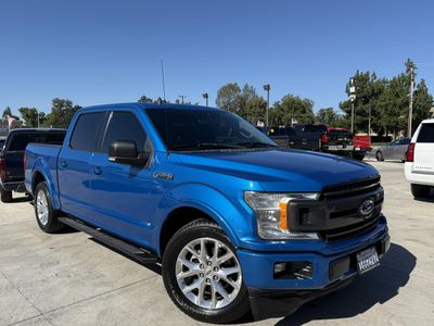 2019 Ford F-150 in Blue — front three-quarter view
