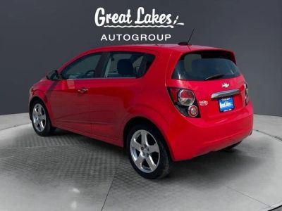 2015 Chevrolet Sonic — rear three-quarter view