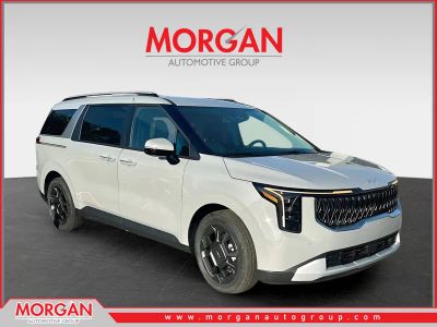 2026 Kia Carnival Hybrid EX in Silver — front three-quarter view