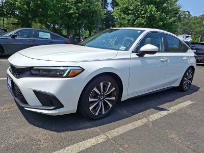 2024 Honda Civic — rear three-quarter view