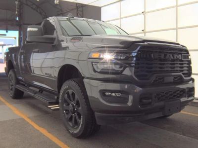 2025 RAM 2500 Big Horn Crew Cab 4x4 6'4' Box in Granite Crystal Metallic Clearcoat — front three-quarter view