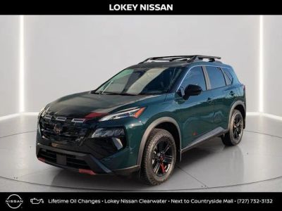 2026 Nissan Rogue Rock Creek in Obsidian Green — front three-quarter view