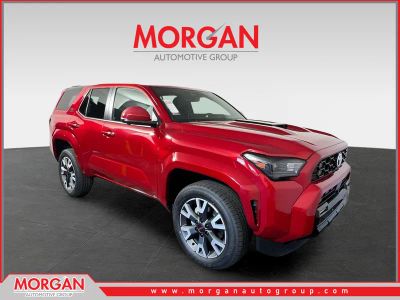 2026 Toyota 4Runner TRD Sport Premium in Supersonic Red — front three-quarter view