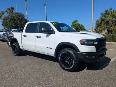 2025 RAM 1500 Rebel in Bright White Clearcoat — front three-quarter view