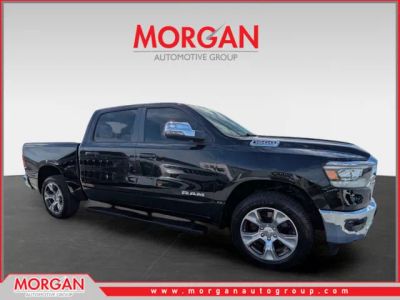 2023 Ram 1500 Laramie in Black — front three-quarter view