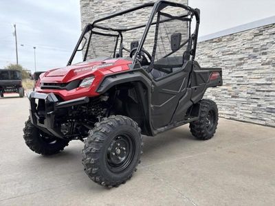 2025 Honda Pioneer 1000 in HERO RED — front three-quarter view