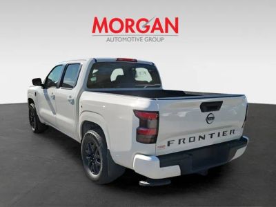 2026 Nissan Frontier — rear three-quarter view