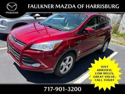 2014 Ford Escape FWD 4dr SE in Ruby Red Tinted Clearcoat — front three-quarter view