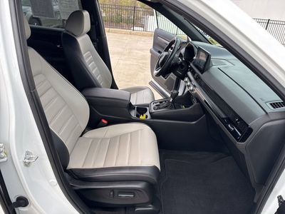 2023 Honda CR-V Hybrid Sport Touring RS6H9PKW — front three-quarter view