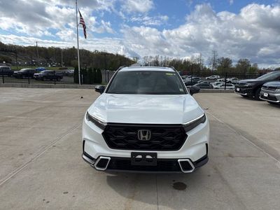 2023 Honda CR-V Hybrid Sport Touring — rear three-quarter view