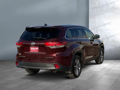 2019 Toyota Highlander — rear three-quarter view