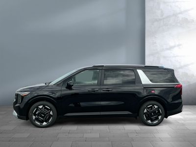 2026 Kia Carnival — rear three-quarter view