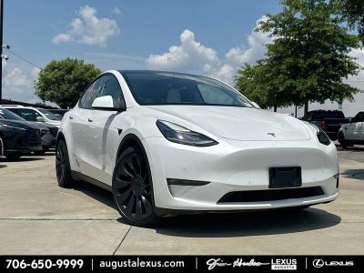 2021 Tesla Model Y Performance in Pearl White Multi-Coat — front three-quarter view