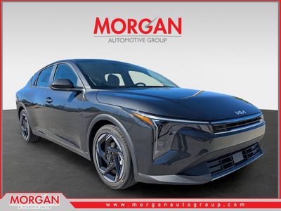 2025 Kia K4 EX in Interstellar Gray — front three-quarter view