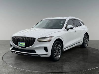 2022 Genesis GV70 — rear three-quarter view