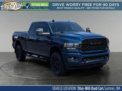 2023 RAM 2500 Big Horn in Patriot Blue Pearlcoat — front three-quarter view