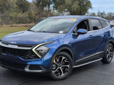 2023 Kia Sportage EX in Blue — front three-quarter view