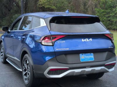 2023 Kia Sportage — rear three-quarter view