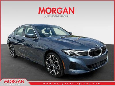 2025 BMW 3 Series 330i in Arctic Race Blue Metallic — front three-quarter view
