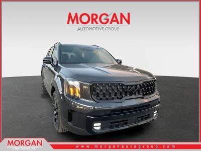 2025 Kia Telluride SX-Prestige X-Line in Panthera Metal — front three-quarter view
