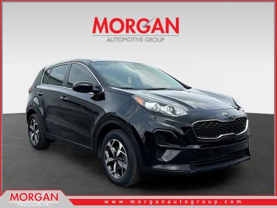 2021 Kia Sportage LX in Black Cherry — front three-quarter view