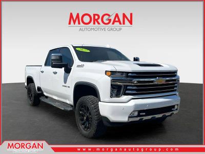 2022 Chevrolet Silverado 2500HD High Country in White — front three-quarter view