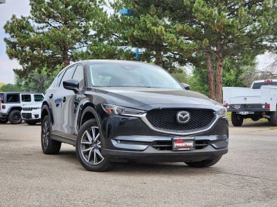 2018 Mazda Mazda CX-5 Grand Touring in Jet Black Mica — front three-quarter view