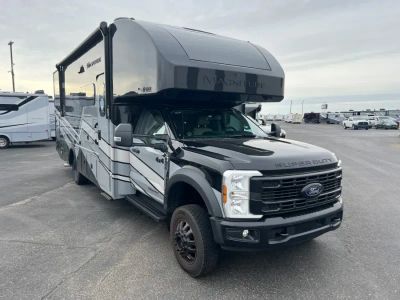 2027 Thor Motor Coach MAGNITUDE GRAND — front three-quarter view