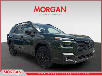 2026 Subaru Outback Limited in Deep Emerald Green Pearl — front three-quarter view
