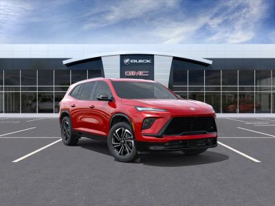 2026 Buick Enclave Sport Touring in Cherry Red Tintcoat — front three-quarter view