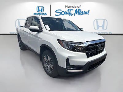 2026 Honda Ridgeline RTL in Platinum White Pearl — front three-quarter view