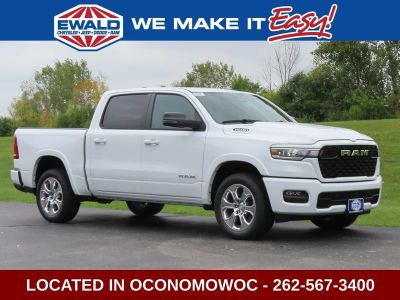 2026 RAM 1500 RAM 1500 BIG HORN CREW CAB 4X4 5'7' BOX in Bright White Clear-Coat Exterior Paint — front three-quarter view