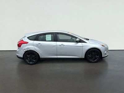 2014 Ford Focus — rear three-quarter view