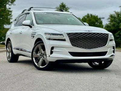 2024 Genesis GV80 in White — front three-quarter view